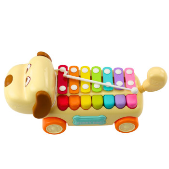 Jeżdżący Piesek Cymbałki Ruchome Uszy Ogon Pałeczka Na Sznurku