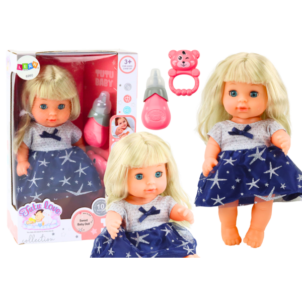 Lalka W Granatowej Sukience Siusiająca Butelka Grzechotka Dźwięki